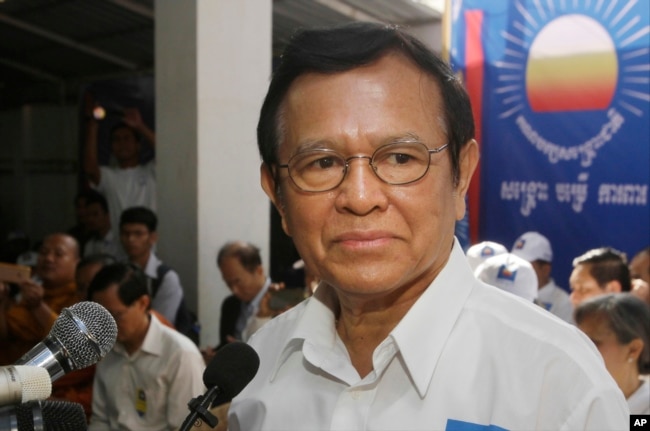 FILE - Opposition party Cambodia National Rescue Party (CNRP) President Kem Sokha adressess party supporters during the party's political congress in Phnom Penh, Cambodia, March 2, 2017.