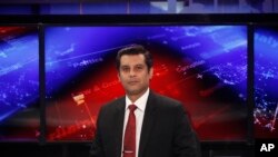 FILE - Senior Pakistani journalist Arshad Sharif poses for photograph for his talk show at a studio, in Islamabad, Pakistan, on Dec. 15, 2016. Pakistani investigators claim that his killing in Kenya was a “planned assassination," according to a report released Dec. 7, 2022. 