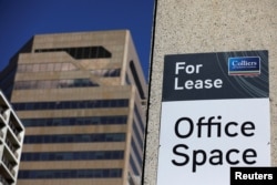 FILE PHOTO: A sign advertising office space for lease is seen in Calgary