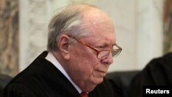 FILE - Judge Stephen R. Reinhardt listens to arguments during hearing on California's Proposition 8 at the 9th Circuit Court of Appeals in San Francisco, Dec. 6, 2010.