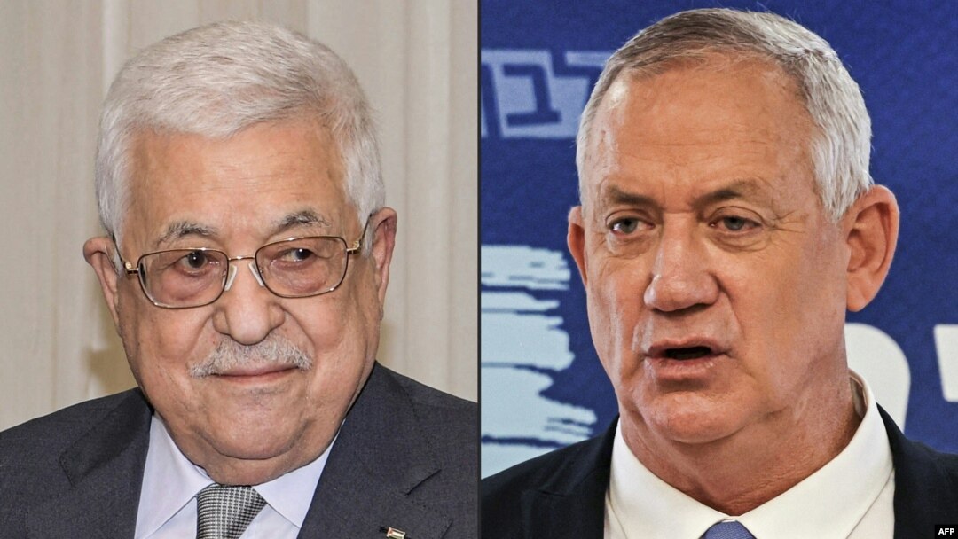 FILE - At left, Palestinian President Mahmoud Abbas is seen in a handout photo provided by the Palestinian Authority's press office, Aug. 1, 2021; and Israeli Defense Minister Benny Gantz is seen on June 7, 2021.