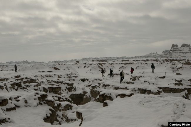 Youth Camp Participants Explore the Door Trail in the Snow (NPS / Dudley Edmondson)