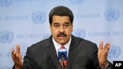 FILE - Venezuelan President Nicolas Maduro speaks to reporters at United Nations headquarters in New York, July 28, 2015.