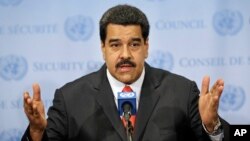 FILE - Venezuelan President Nicolas Maduro speaks to reporters at U.N. headquarters in New York, July 28, 2015.