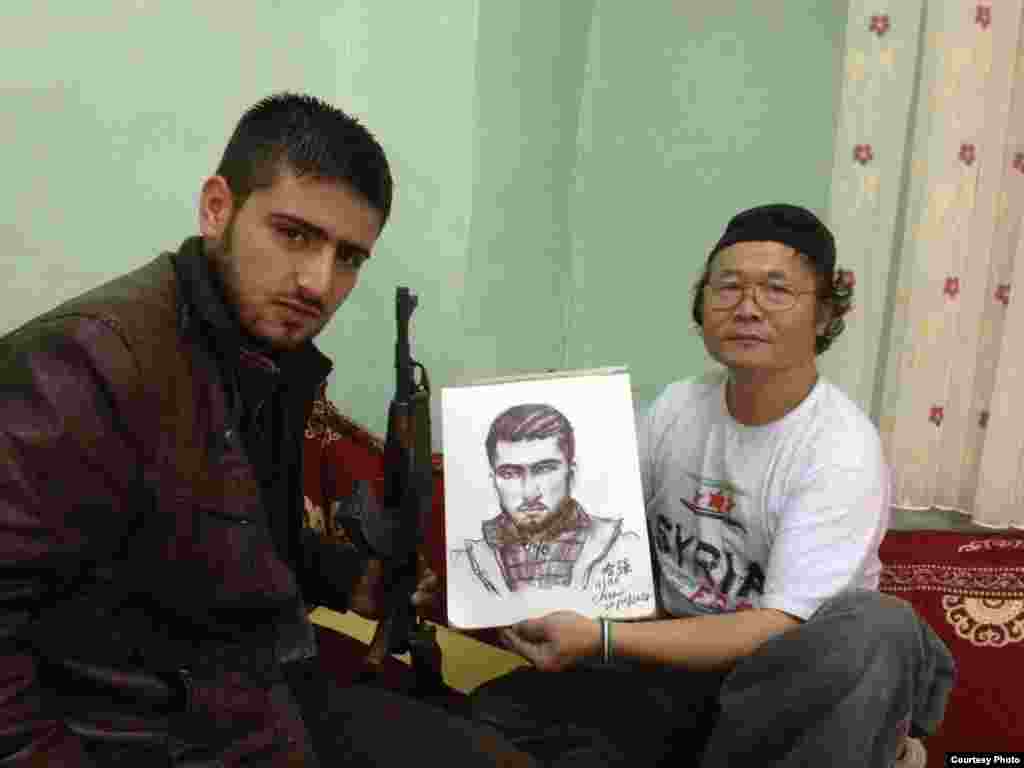 陈维明去年为叙利亚反抗军战士绘像（陈维明提供）