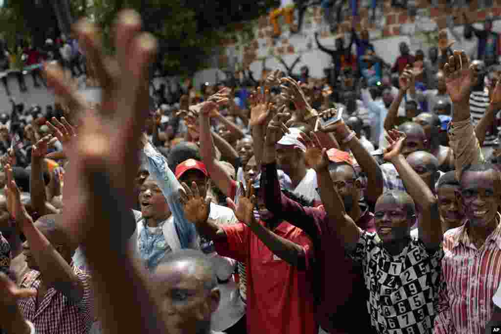 Supporters of opposition presidential candidate Felix Tshisekedi cheer him at the UDPS party headquarters in Kinshasa, in the Democratic Republic of Congo.