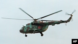 Helikopter Rusia Mi-8 dalam misi di Chechnya (foto: dok). Sebuah elikopter Mi-8 Rusia lainnya ditembak jatuh di Suriah. 