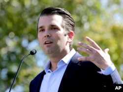 FILE - Donald Trump Jr. campaigns for his father Republican presidential candidate Donald Trump in Gilbert, Arizona, Nov. 4, 2016.