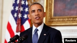 Tổng thống Obama nói rằng khi 'vô số người vô tội đối mặt với 1 cuộc thảm sát' thì Mỹ 'không thể ngoảnh mặt làm ngơ.'