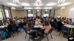 Preservice teachers take an ethics seminar provided by the Athens State college of education on October 11, 2022, in Athens, Alabama. The seminar aimed to help prepare prospective teachers for real-world issues in the education workplace. (AP Photo/Vasha Hunt)