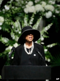 Lonnie Ali, widow of Muhammad Ali, speaks during his memorial service in Louisville, Ky., June 10, 2016.