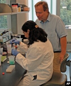 Rob Fleischer (right), head of the Center for Conservation and Evolutionary genetics, says scientists at the Zoo's new DNA lab work on nearly all of the Zoo's conservation efforts