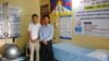 Tenzin Jigme and Penchen Sangpo started the first Tibetan-owned physical therapy clinic in India and are part of a program to support Tibetan entrepreneurs. (Amy Yee for VOA)