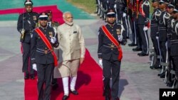 Indian Prime Minister Narendra Modi inspects the guard of honour during a welcome ceremony at Republic quare in Maldive's capital Male on June 8, 2019.