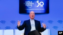 Klaus Schwab, founder and Executive Chairman of the World Economic Forum poses for a photo after an interview with the Associated Press in Davos, Switzerland, Sunday, Jan. 19, 2020. The 50th annual meeting of the forum will take place in Davos from…