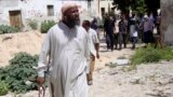 Muktar Robow, yahoze ar'umukuru w'umuhari al-Shabab, ari m'uburaruko bw'umurwa mukuru wa Somaliya, i Mogadishu.
