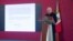 Mexico's President Andres Manuel Lopez Obrador speaks as a screen displays the letter he sent to U.S. President-elect Joe Biden during a news conference at the National Palace, in Mexico City, Mexico, Dec. 15, 2020.