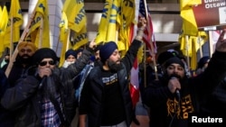 FILE - Sikh protesters rally outside the Consulate General of India, days after Canada expelled six Indian diplomats, linking them to the murder of a Sikh separatist leader and alleging broader efforts against Sikhs in Canada, in Toronto, Oct. 18, 2024. 