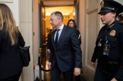 Ambassador Kurt Volker, former special envoy to Ukraine, leaves the hearing room as they conclude a public impeachment hearing of President Donald Trump on Capitol Hill in Washington, Tuesday, Nov. 19, 2019.