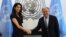 International human rights lawyer Amal Clooney shakes hands with United Nations Secretary General, Antonio Guterres, at U.N. headquarters in New York, March 10, 2017. 