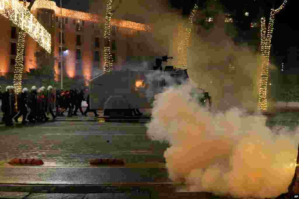 Albanian police and demonstrators clash for the third day, protesting the death of a 25-year-old man shot by a police officer, in Tirana.