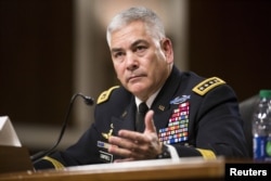 FILE - U.S. Army General John Campbell, commander of the Resolute Support Mission and United States Force - Afghanistan, testifies before a Senate Armed Services Committee hearing on "The Situation in Afghanistan" on Capitol Hill in Washington, Oct. 6, 2015.