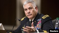 FILE - U.S. Army General John Campbell, commander of the Resolute Support Mission and United States Force - Afghanistan, testifies before a Senate Armed Services Committee hearing on "The Situation in Afghanistan" on Capitol Hill in Washington, Oct. 6, 2015. 