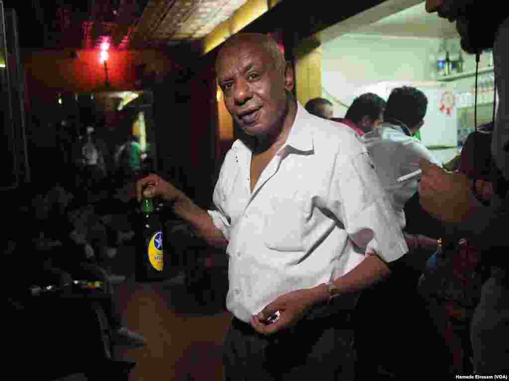 "My Egyptian friends and clients are back having their beer, and I’m happy to serve them beer, and hear their jokes all the night,” barman Uncle Abdo, 62, says in Cairo, Egypt, June 5, 2016. Ramadan ended on Tuesday.