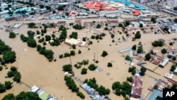 Houses are partially submerged following a dam collapse in Maiduguri, Nigeria, Sept. 10, 2024. 