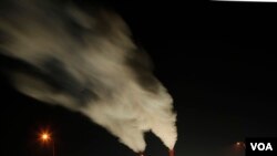 (File) Smoke rises from the stacks of the La Cygne Generating Station coal-fired power plant in La Cygne, Kansas.