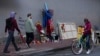 People view a memorial to the victims of a deadly truck attack on Bourbon Street in the French Quarter, Jan. 3, 2025, in New Orleans.