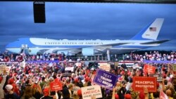 Presidenti Donald Trump flet para përkrahësve të tij në Aeroportin Ndërkombëtar MBS në Freeland, Miçigan.