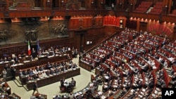 Italian Prime Minister Silvio Berlusconi addresses the lower chamber of deputies in Rome (File)