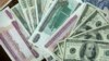 မြန်မာကျပ်ငွေများနဲ့ အမေရိကန်ဒေါ်လာများ။ (သြဂုတ် ၁၈၊ ၂၀၁၁)