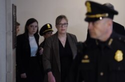 Catherine Croft, a specialist on Ukraine with the State Department, arrives for a closed-door deposition at the U.S. Capitol in Washington, Oct. 30, 2019.