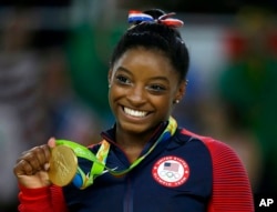 Atileeti Amerikaa Simone Biles dubartii addunyaa jabduu jedhanii bara 2016 Riyootti badhaasanbadhaasan