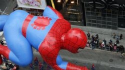 The Spider-Man balloon floats through Times Square during the Macy's Thanksgiving Day parade in New York on Thursday