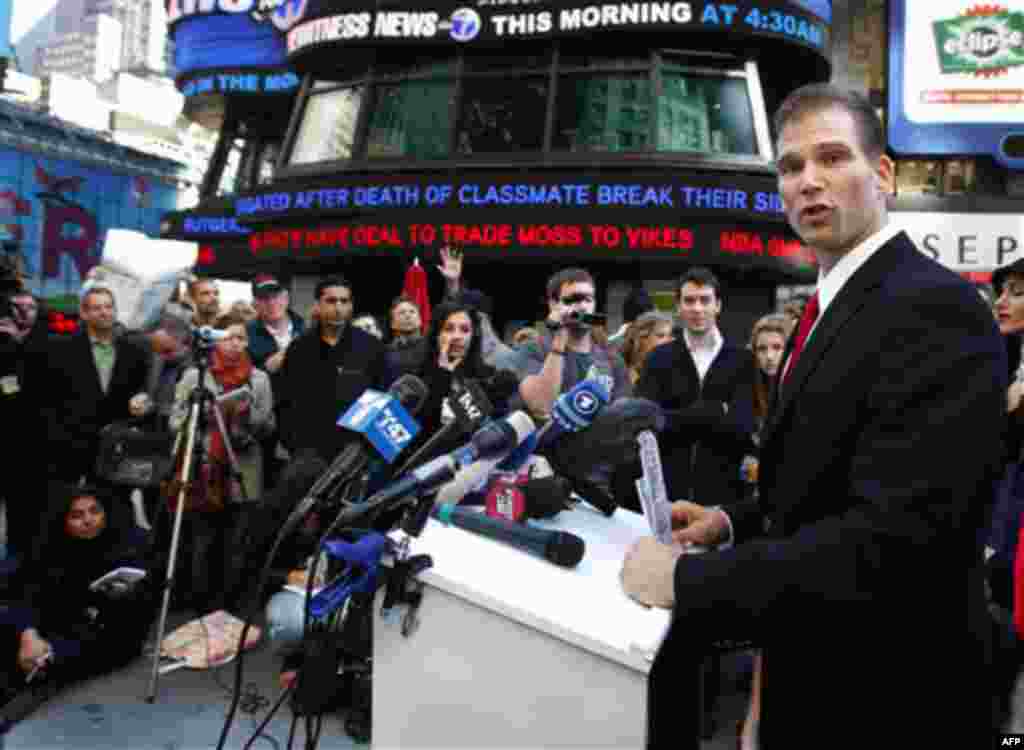 Robert Burck, known far and wide as the Naked Cowboy, announces his 2012 presidential bid in Times Square in New York, Wednesday, Oct. 6, 2010. Burck is a tourist attraction known for strumming his guitar in his white underwear, boots and a cowboy hat. (