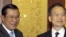 Chinese Premier Wen Jiabao, right, shakes hands with Cambodia's Prime Minister Hun Sen before their meeting in the Great Hall of the People in Beijing, 2008.