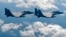 FILE - In this photo provided by South Korea Defense Ministry, South Korean air force F-15K fighter jets drop bombs as they fly over the Korean Peninsula during a joint drills with the U.S., Sept. 18, 2017. On Thursday, the air force said one of its F-15K jets crashed at a mountain in the country's rural south.