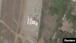 FILE - A view of the Typhon missile system is seen at Laoag International Airport, in Laoag, Philippines, April 26, 2024, in this satellite image. (2024 Planet Labs Inc./Handout via Reuters)