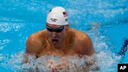 Chase Kalisz of the United States swims in the Men's 400m individual medley at the 2020 Summer Olympics, July 25, 2021, in Tokyo, Japan.