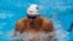 Chase Kalisz of the United States swims in the Men's 400m individual medley at the 2020 Summer Olympics, July 25, 2021, in Tokyo, Japan.
