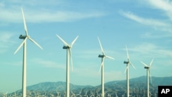 Wind turbines similar to these in California's Yucca Valley region are soon going to be part of Africa's largest wind farm, in northern Kenya (AP)