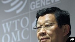 China's Minister of Commerce Chen Deming addresses a news conference at the 8th World Trade Organization Ministerial Conference in Geneva, December 15, 2011.