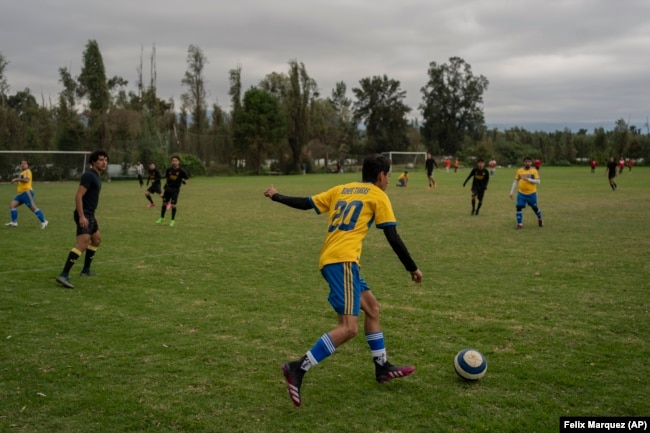 Amateur soccer players from the Chivas team play on a field in the Xochimilco borough of Mexico City, on Sunday, October 20, 2024. (AP Photo/Felix Marquez)