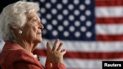 FILE: Former U.S. first lady Barbara Bush listens to her son, President George W. Bush, as he speaks at an event on social security reform in Orlando, Florida, March 18, 2005.