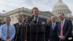Sen. Rand Paul, R-Ky., center, joined by, from left, Rep. Jim Jordan, R-Ohio, Rep. Mark Sanford, R-S.C., Rep. Louie Gohmert, R-Texas, and Sen. Mike Lee, R-Utah, speaks about health care during a news conference on Capitol Hill in Washington, March 7, 2017