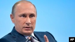 Presiden Vladimir Putin mengatakan Rusia akan terus membantu pasukan Suriah melawan agresi teroris (foto: dok).