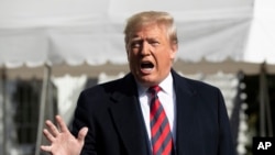 FILE - President Donald Trump speaks to reporters outside the White House, in Washington, Nov. 9, 2019.